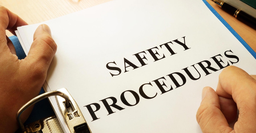 Safety procedures in a blue folder. Work Safety concept.