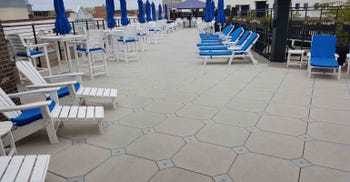 A hotel roof deck in Charleston, SC features concrete pavement slabs.