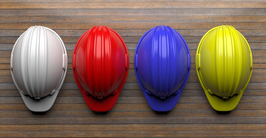 White red blue and yellow hard hats 