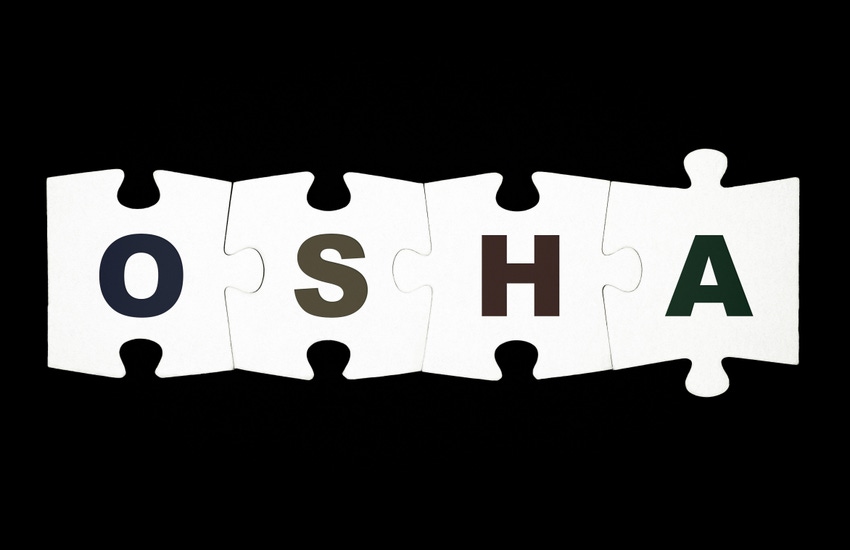 Four pieces of puzzle with letters OSHA are connected together on black background