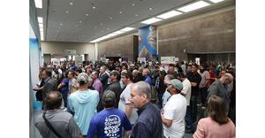 Attendees make their way to the PSP/Deck Expo show floor