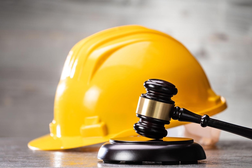 Photo illustration of construction law legal litigation with a gavel.