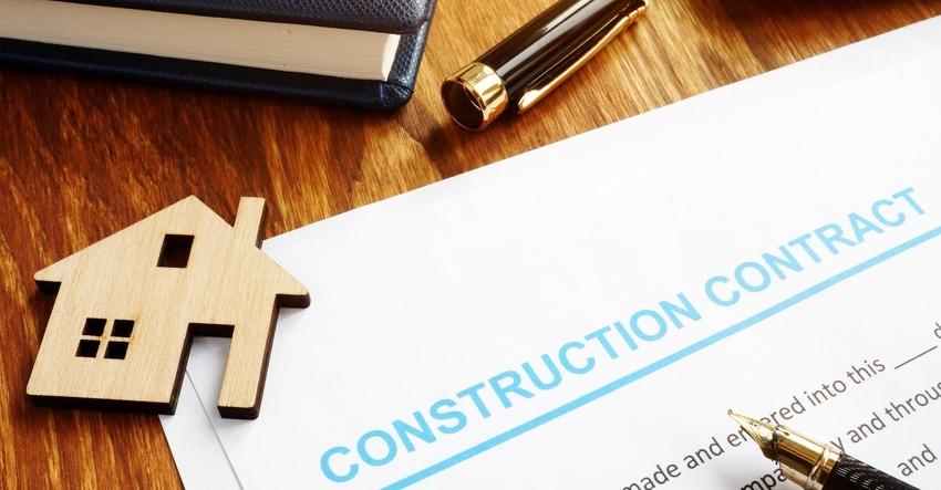Construction contract, model of house and calculator.