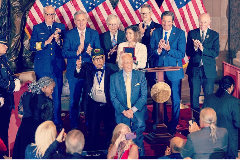 Dave Yoho receiving the 2022 Congressional Gold Medal.jpg