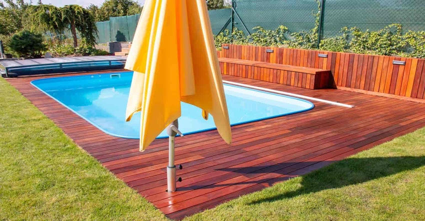 Wood pool deck design around swimming pool