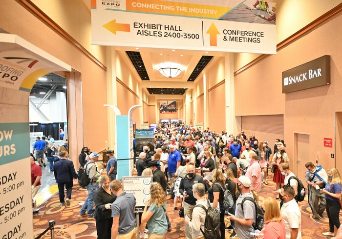 Attendees approach and enter the Expo Hall as IRE 2021 kicked off