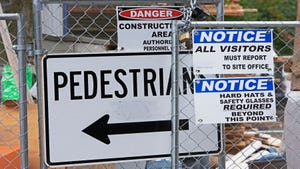 Safety signs at entrance to construction site