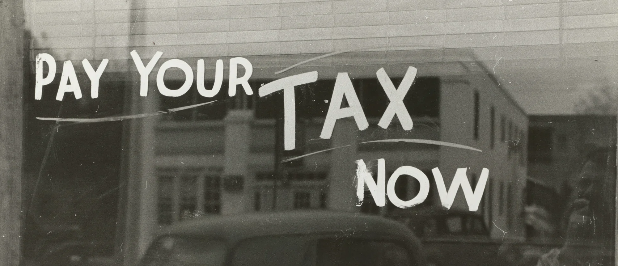 Pay your tax written on a window