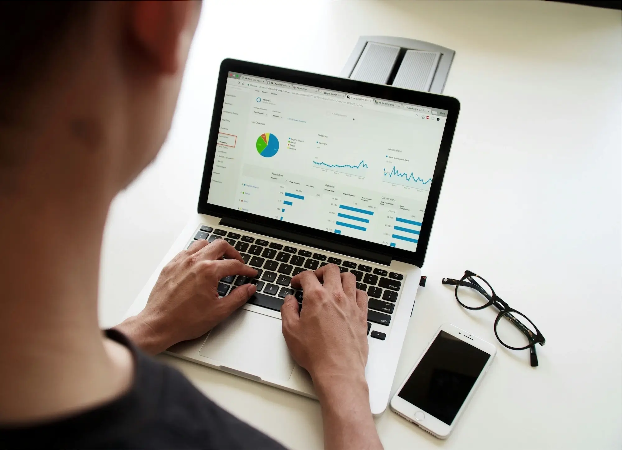 Owner reviewing business metrics on laptop