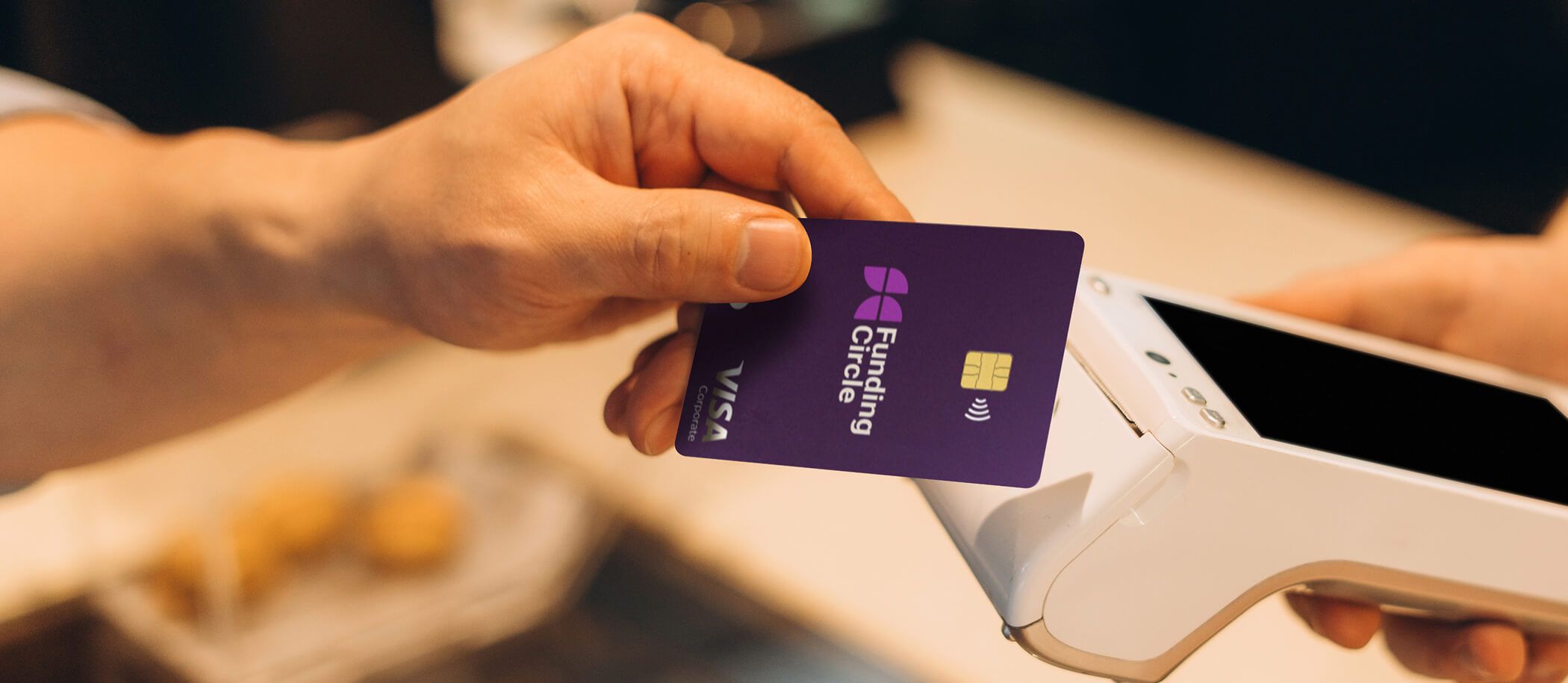 Business owner paying with Funding Circle card