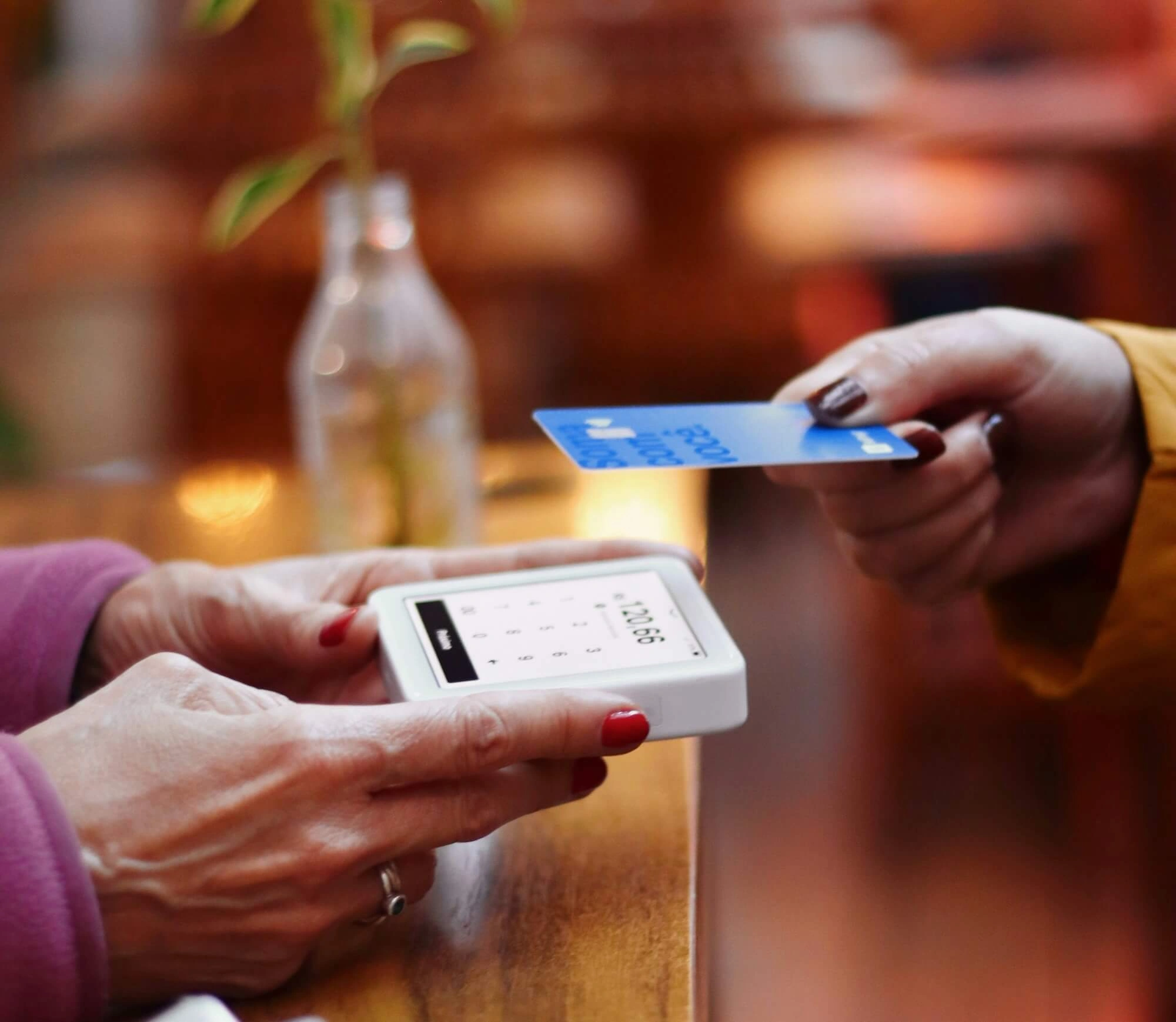 Business owner paying with credit card