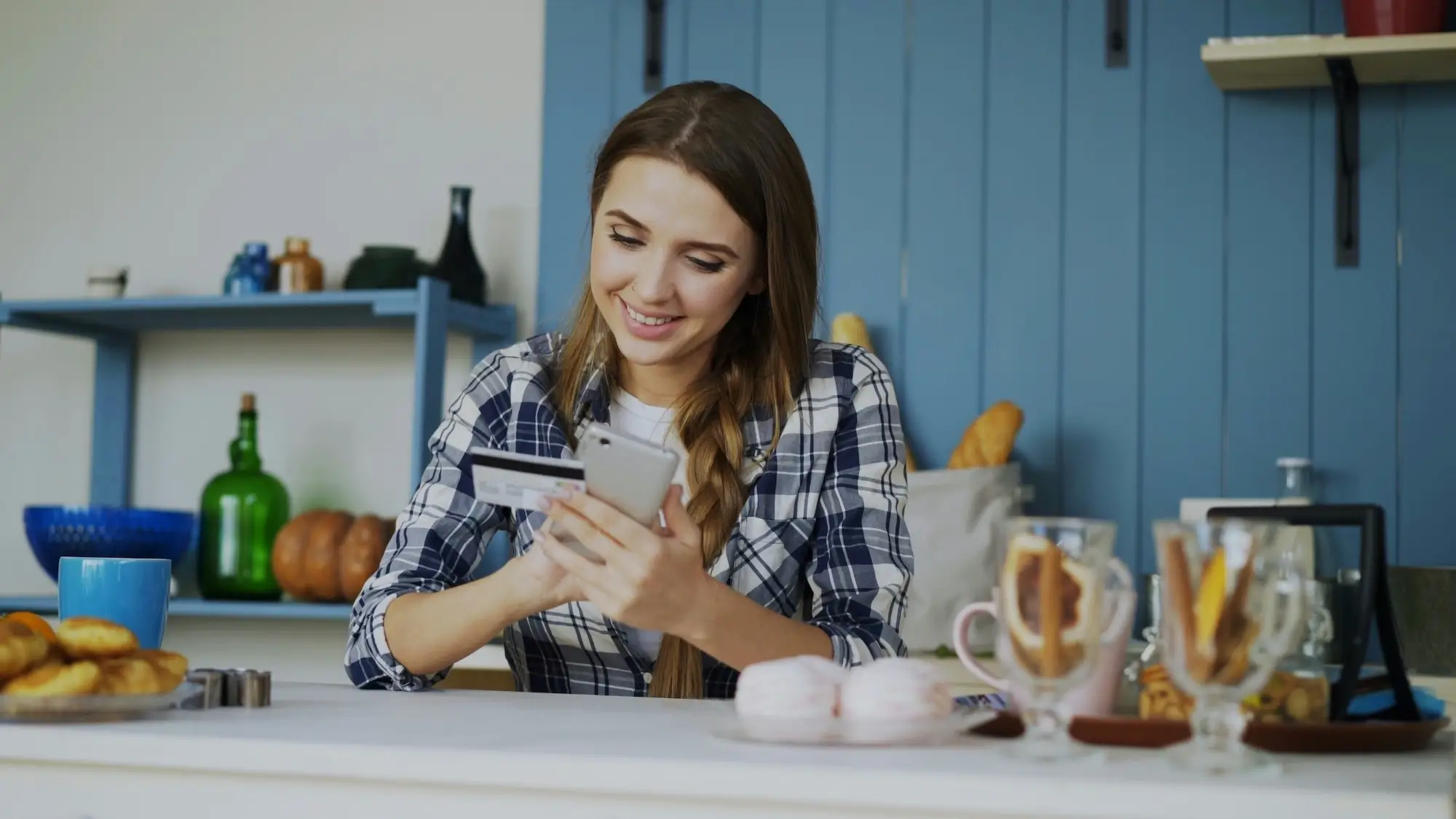 Female business owner making purchase with credit card