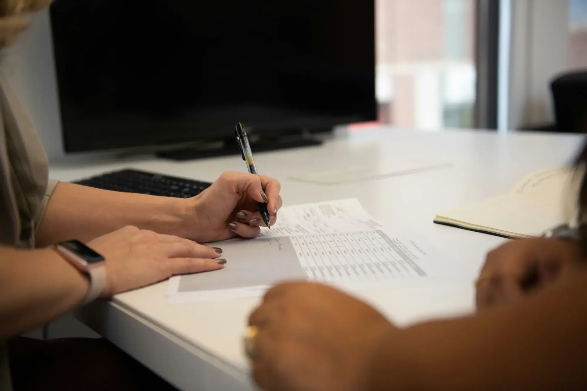 Business owner signing document