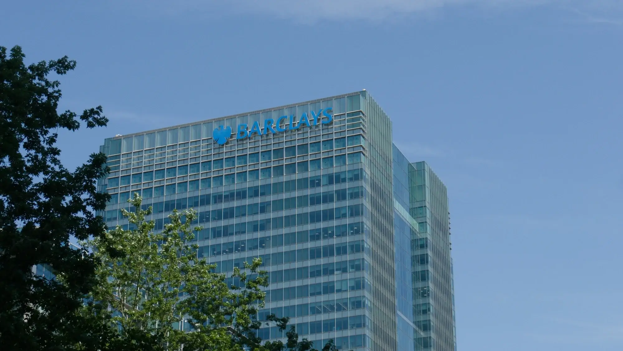 Large office building with Barclays logo