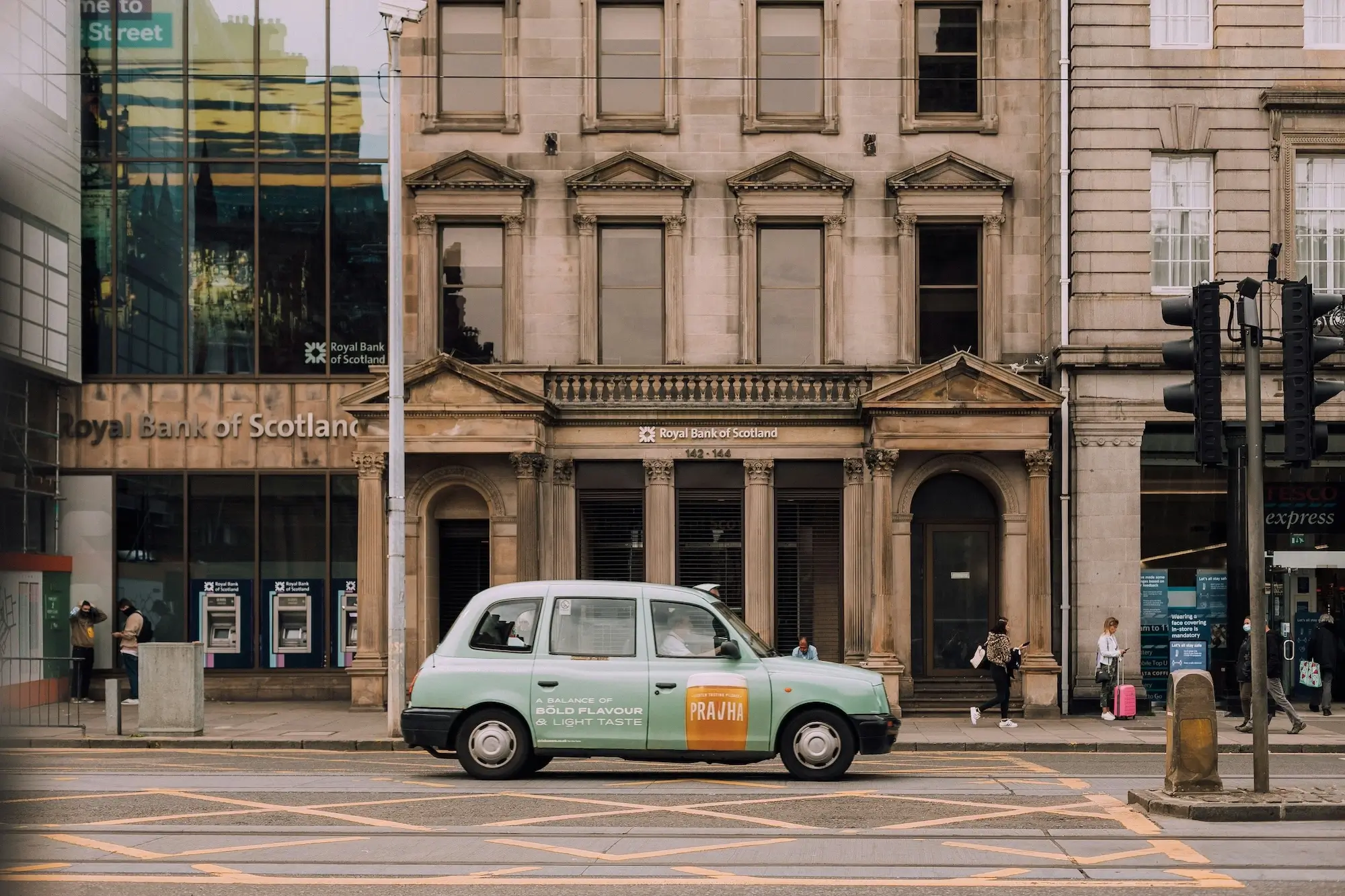 Car parked in front of bank