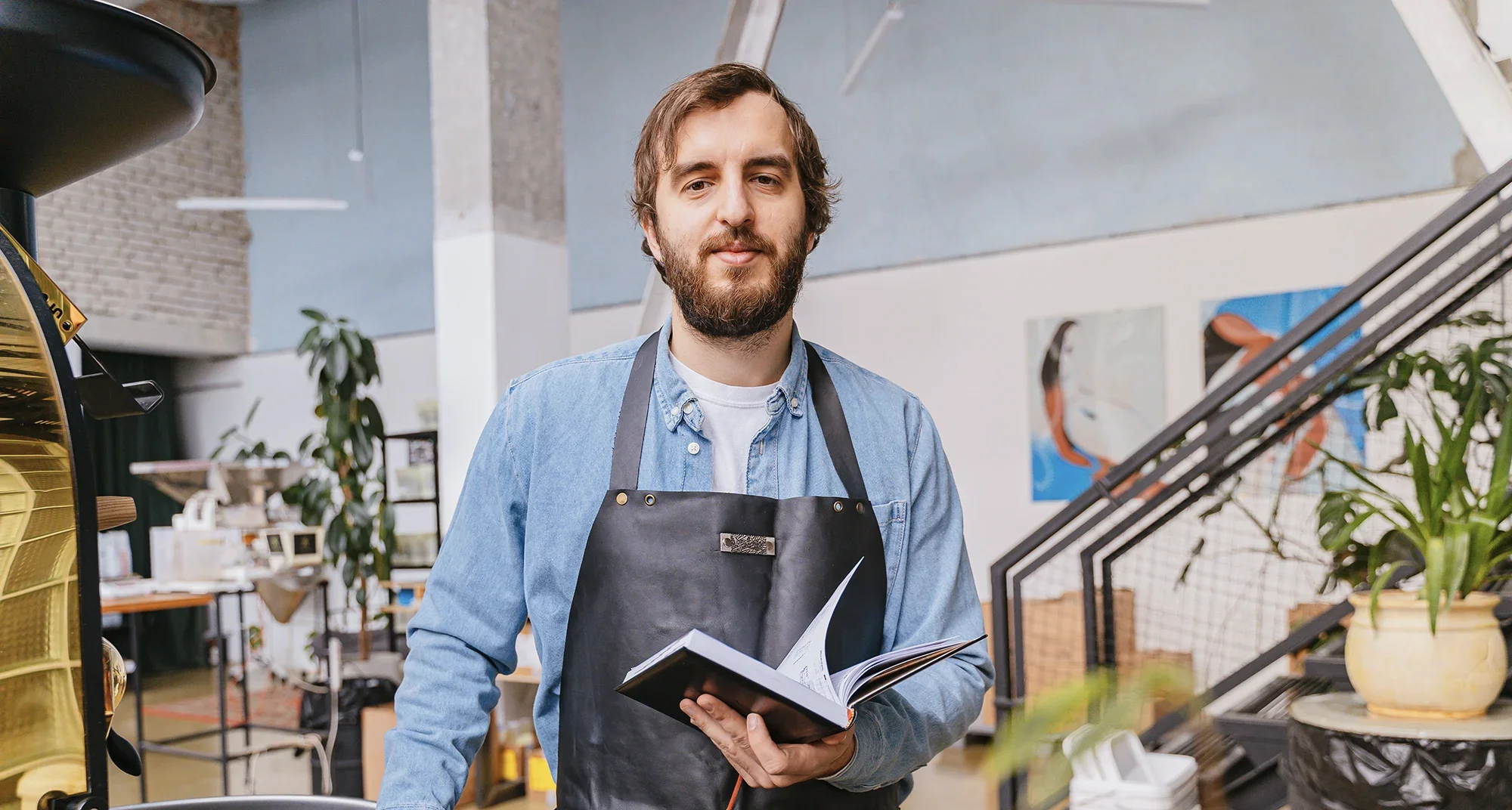 A coffee roastery owner working