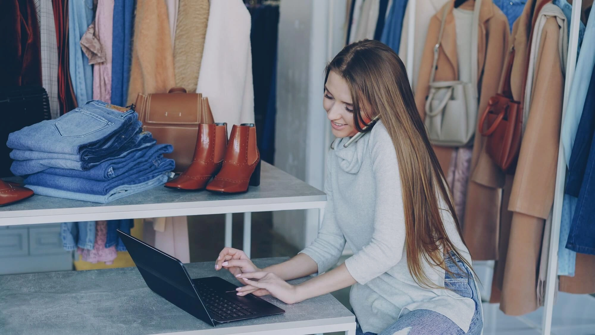 Business owner browsing purchase options on laptop