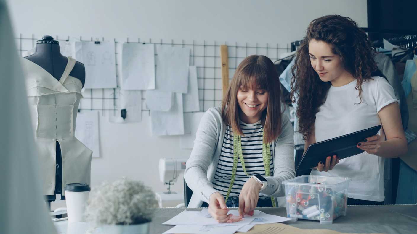Employees working on design