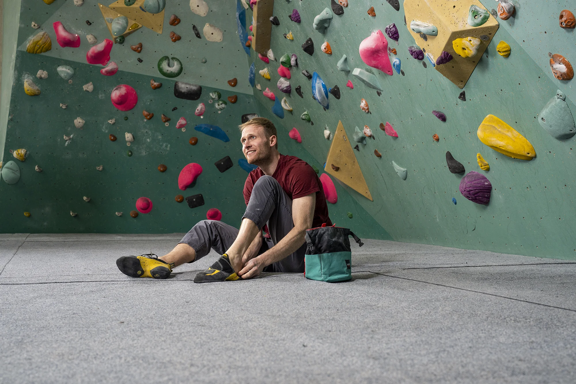 Wall climber sat on floor