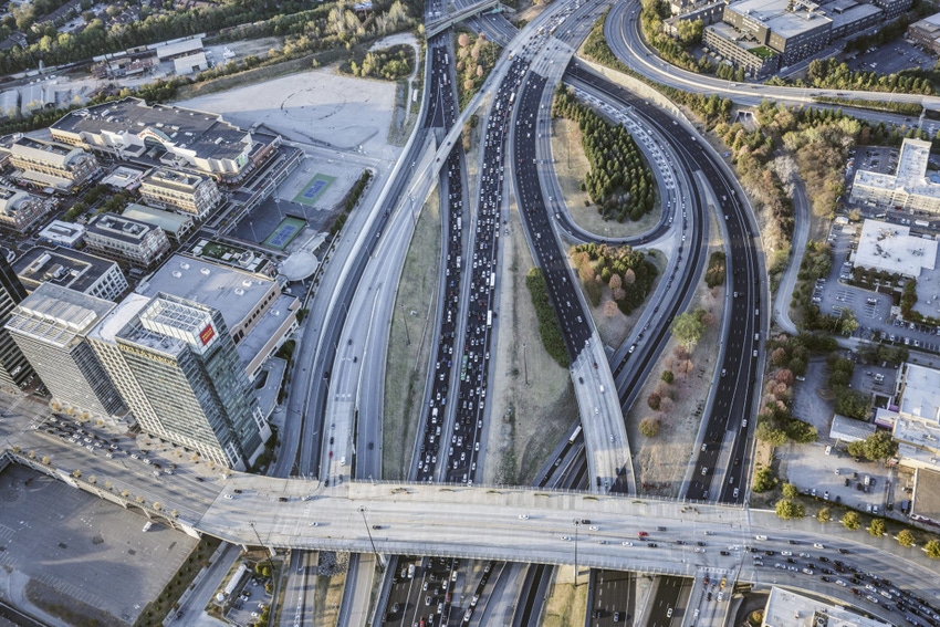 Image shows an aerial view of traffic in Atlanta at rush hour. Image shows an aerial view of traffic in Atlanta at rush hour.