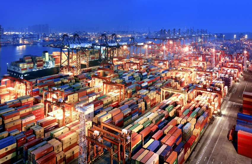 Image shows the Hong Kong Container Terminal at dusk.