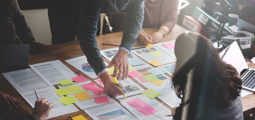 Photo of business people strategizing ideas Photo of business people strategizing ideas