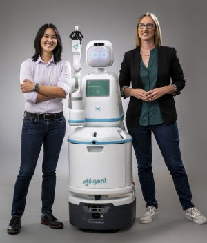 Diligent Robotics founders Andrea Thomaz and Vivian Chu with Moxi