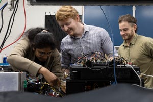 The Quantum Brilliance team installing the system at ORNL The Quantum Brilliance team installing the system at ORNL