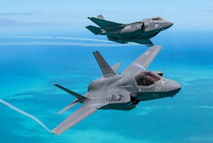 Two F-35B aircraft in flight