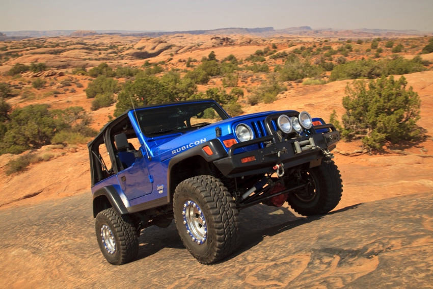 Image shows A Jeep on the Fins & Things Trail, in the Sand Flats Recreation Area near Moab, Utah.
