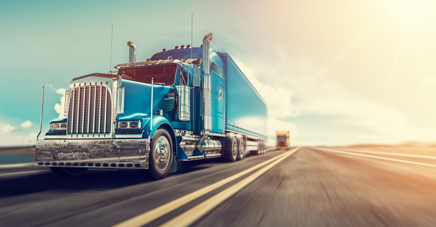 Image shows a truck on the highway.