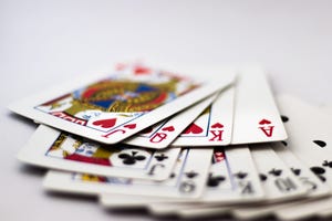 Image shows playing cards fanned out