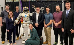 NASA’s Dexterous Robotics Team and U.S. State Department representatives with NASA’s Valkyrie robot at Woodside Energy.