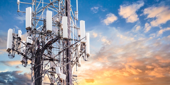 Image shows a 5G cellular communications tower for mobile phone and video data transmission tower. Image shows a 5G cellular communications tower for mobile phone and video data transmission tower.