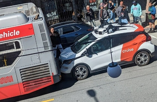 Image shows a Cruise robotaxi that rear-ended a bus in San Francisco.