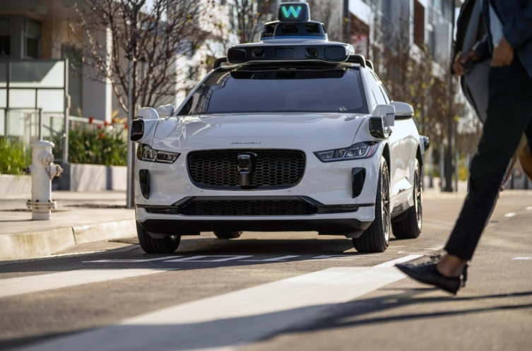 A Waymo self-driving taxi on a road