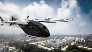 Eve Air Mobility's electric aerial vehicle (EAV) flying above a city.