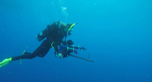 Scientists at the University of Oregon use an underwater camera to collect data