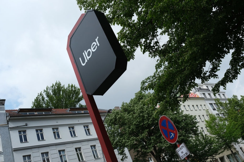 A sign stands outside an Uber drivers registration office on May 10, 2019 in Berlin, Germany.