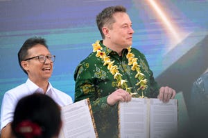 Elon Musk and Indonesia's Health Minister Budi Gunadi Sadikin at the inauguration