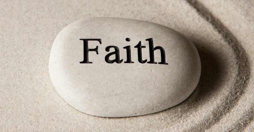 Rock with the word faith carved into it