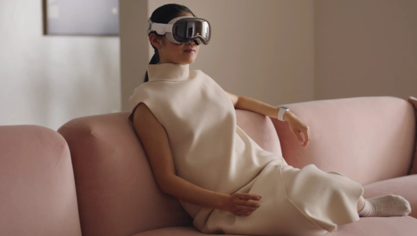 Woman wearing Apple's Vision Pro VR/AR headset 