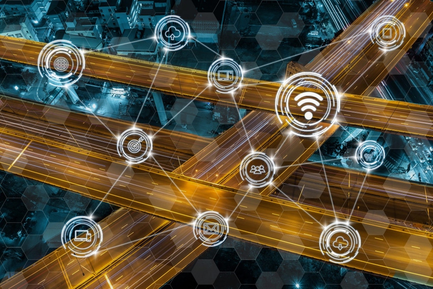 Wireless communication connecting of smart city Internet of Things Technology over Top view of expressway at night