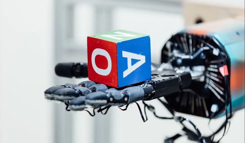 OpenAI's Dactyl robot holding a cube