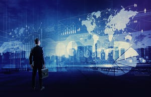 Image shows a businessman looking various graphics of business. Internet of Things.