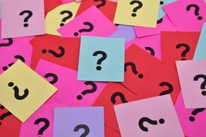 Pile of question marks on colorful sticky notes