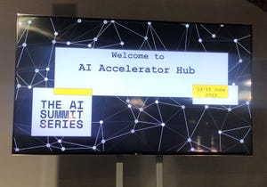 A sign promoting the AI Accelerator Hub at the 2023 AI Summit London