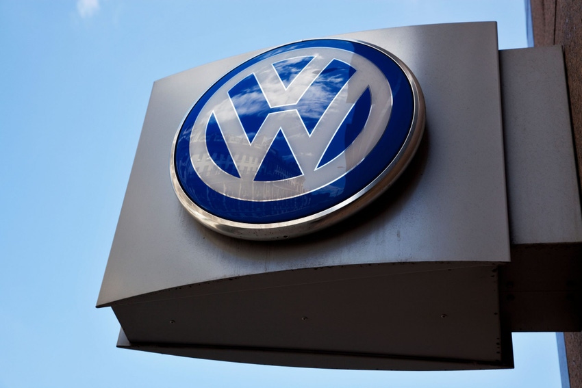 Image shows a VW logo outside Volkswagen dealership London, UK