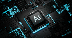 The word AI sitting on a chip on a computer panel.