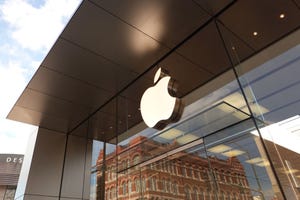 Image shows Apple logo on a store